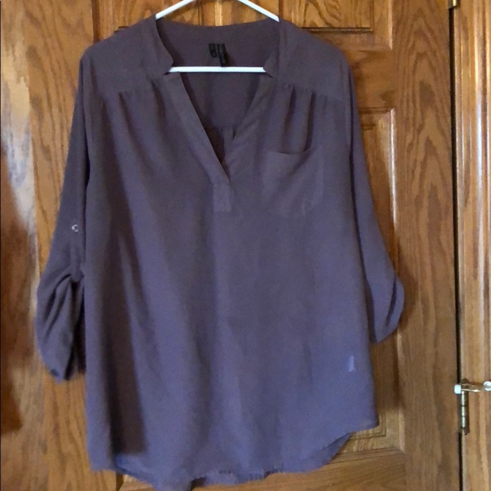 Maurice’s purple shirt